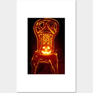 Carved smiling pumpkin on chair Posters and Art